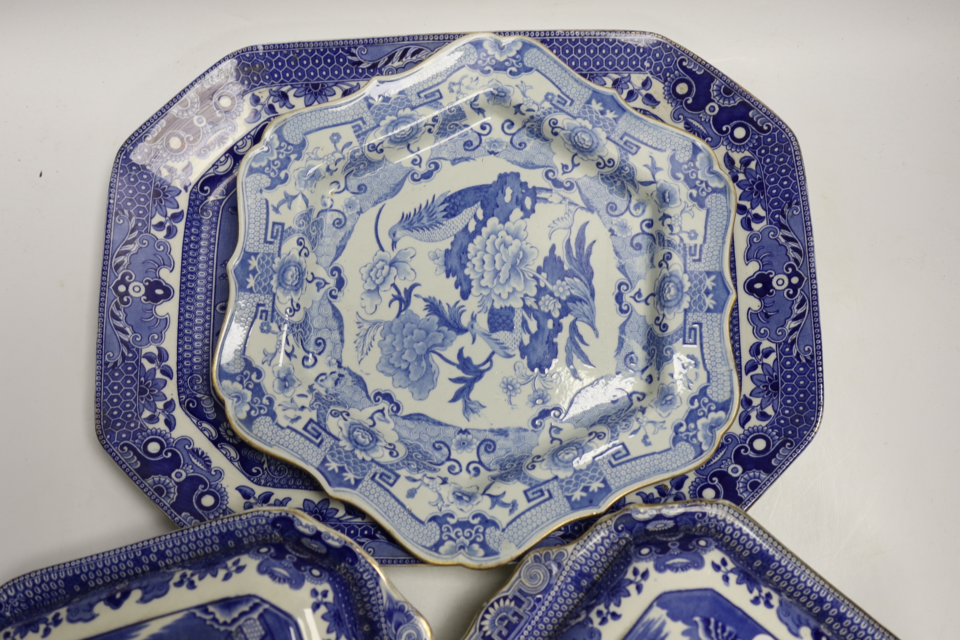 A Mason's stoneware blue and white plate, 2 tureens and a serving dish and a German model of a pug dog